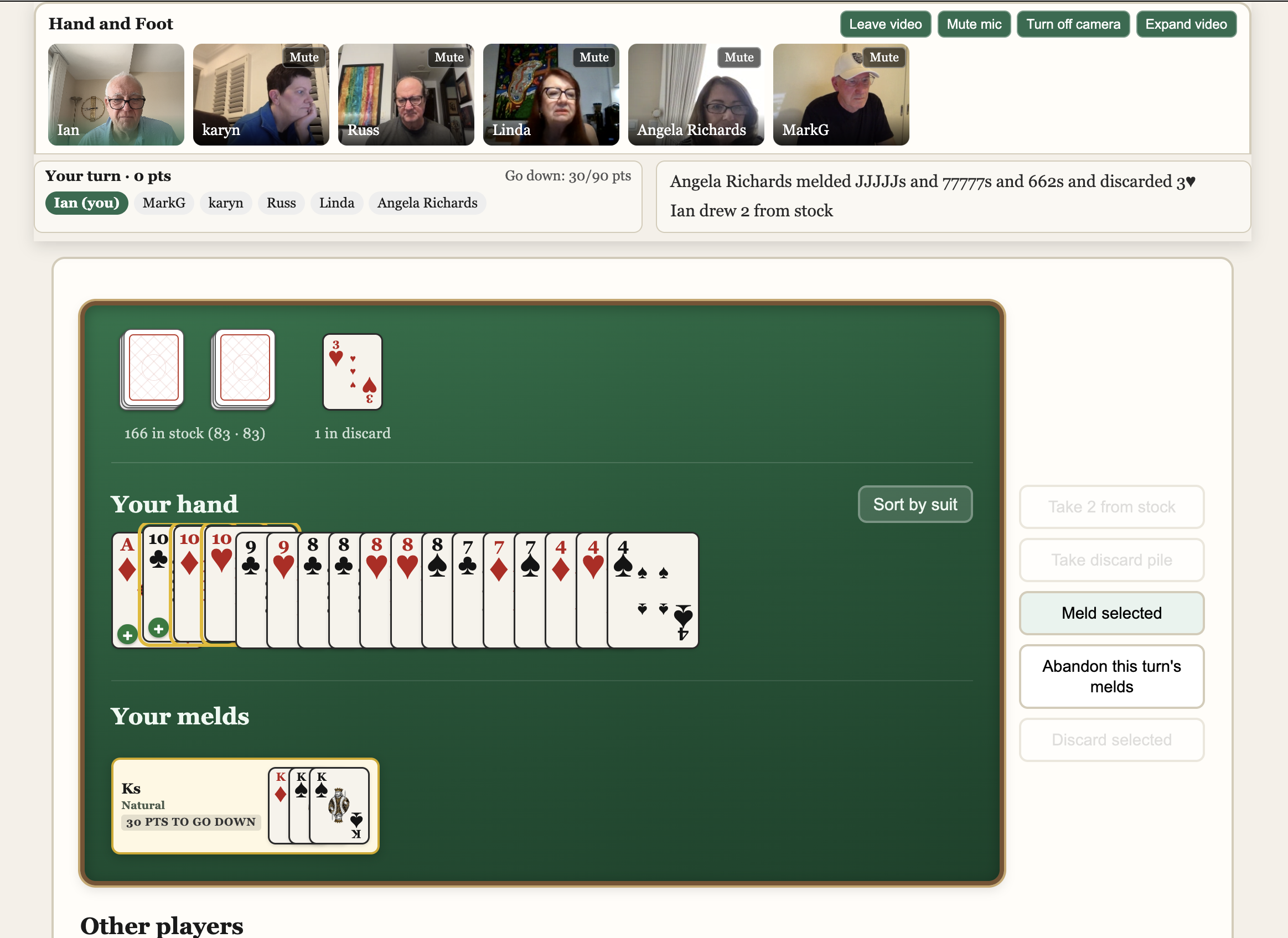 A Hand and Foot game in progress with video chat and cards on the table